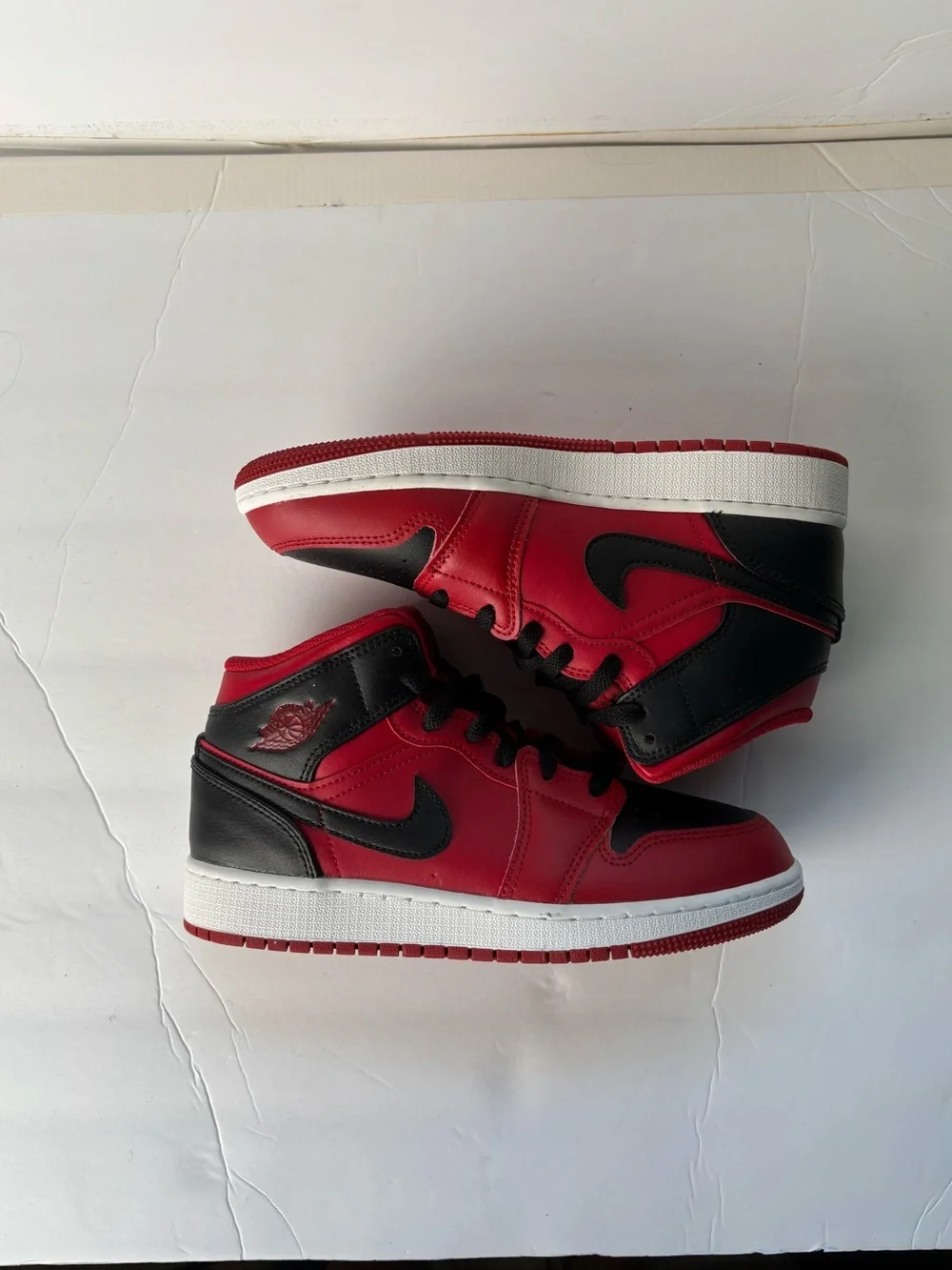 Jordan 1 Mid red/black sneakers. Boys size 5.